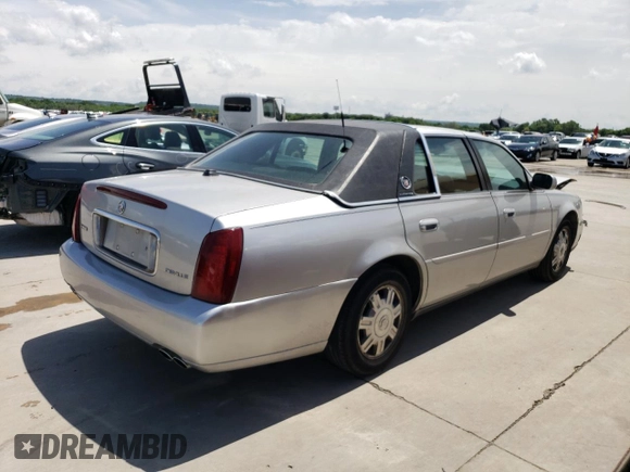 2004 Cadillac DeVille z VIN 1G6KD54Y14U196655, wystawiony jako Copart lot #50882364 z przebiegiem 80 588 mil mil oraz Szkody całkowita. Historia ofert i sprzedaży dostępna na DreamBid. Obrazek 3.