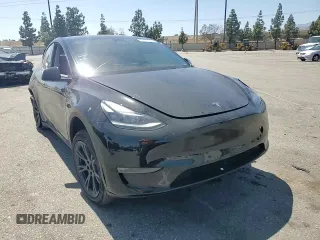 2024 Tesla Model Y Long Range with VIN 7SAYGDEE0RF123793, listed as a Copart auction lot 57177305 with 20,053 mi miles and Salvage title. Bid and sale history available at DreamBid. Image 14.