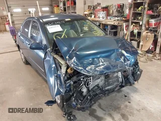 2004 Kia Spectra LX with VIN KNAFE121145012249, listed as a IAAI auction lot 42032571 with 146,748 mi miles. Bid and sale history available at carsss.com. Image 6.
