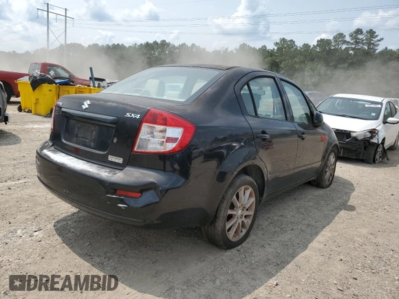 2011 Suzuki SX4 LE z VIN JS2YC5A24B6301058, wystawiony jako Copart lot #59390325 z przebiegiem Nie podano mil oraz Czysty tytuł • Clean title. Historia ofert i sprzedaży dostępna na DreamBid. Obrazek 3.