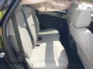 2014 Cadillac SRX Luxury Collection z VIN 3GYFNEE32ES659705, wystawiony jako IAAI lot #42148269 z przebiegiem 140 560 mil mil oraz . Historia ofert i sprzedaży dostępna na DreamBid. Obrazek 8.