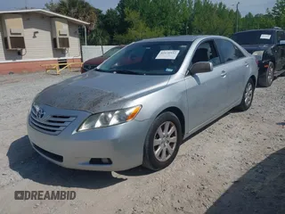 2007 Toyota Camry LE with VIN 4T1BK46KX7U030995, listed as a IAAI auction lot 42170932 with 191,002 mi miles and . Bid and sale history available at DreamBid. Image 2.