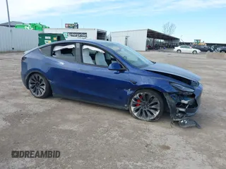 2021 Tesla Model Y Performance z VIN 5YJYGDEF8MF245641, wystawiony jako IAAI lot #41685230 z przebiegiem 25 903 mil mil oraz . Historia ofert i sprzedaży dostępna na DreamBid. Obrazek 12.