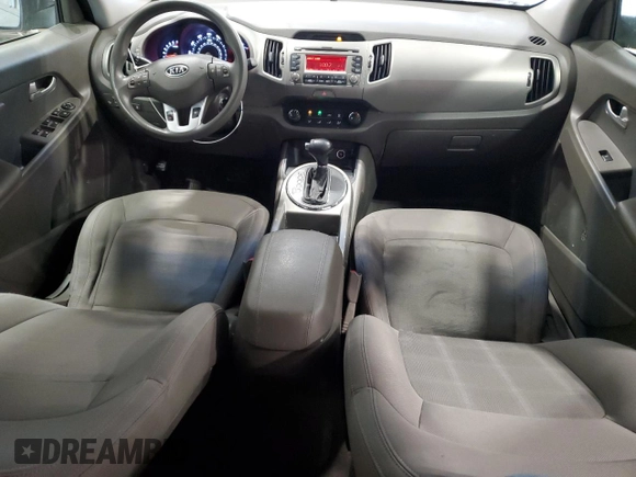 2012 Kia Sportage LX z VIN KNDPB3A24C7179584, wystawiony jako Copart lot #60938465 z przebiegiem 161 362 mil mil oraz Czysty tytuł • Clean title. Historia ofert i sprzedaży dostępna na DreamBid. Obrazek 8.