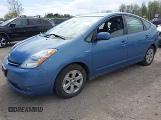 2007 Toyota Prius with VIN JTDKB20U677586433, listed as a IAAI auction lot 42163815 with 105,343 mi miles and . Bid and sale history available at DreamBid. Image 2.
