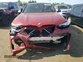 2021 BMW X4 M40i with VIN 5UX2V5C0XM9E78318, listed as a Copart auction lot 57834645 with 67,277 mi miles and Salvage title. Bid and sale history available at DreamBid. Image 5.