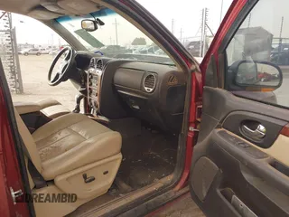 2007 GMC Envoy SLE with VIN 1GKDT13S972277907, listed as a IAAI auction lot 41367293 with 194,760 mi miles. Bid and sale history available at carsss.com. Image 5.