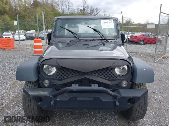 2018 Jeep Wrangler JK Unlimited Sport S with VIN 1C4BJWDG8JL895981, listed as a IAAI auction lot 42048316 with 95,457 mi miles. Bid and sale history available at carsss.com. Image 11.