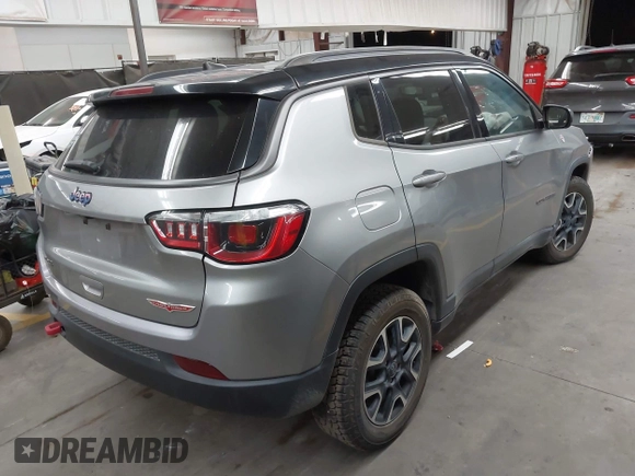 2020 Jeep Compass Trailhawk with VIN 3C4NJDDB7LT203447, listed as a IAAI auction lot 42637452 with 113,896 mi miles and . Bid and sale history available at DreamBid. Image 4.