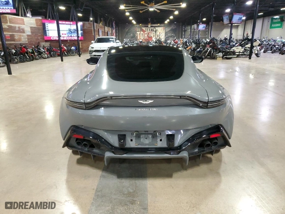 2020 Aston Martin Vantage with VIN SCFSMGAW6LGN03859, listed as a Copart auction lot 52294204 with 47,486 mi miles and Salvage Title. Bid and sale history available at carsss.com. Image 4.