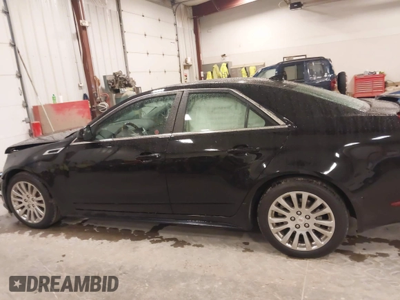2012 Cadillac CTS Premium with VIN 1G6DP5E30C0108722, listed as a IAAI auction lot 41844089 with 176,525 mi miles and . Bid and sale history available at DreamBid. Image 14.