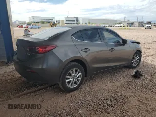 2016 Mazda 3 i Sport with VIN JM1BM1U75G1309459, listed as a Copart auction lot 52562795 with 147,418 mi miles and Salvage Title. Bid and sale history available at DreamBid. Image 3.