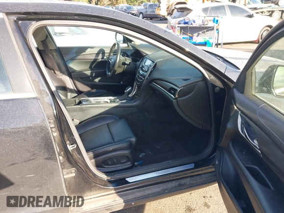 2013 Cadillac ATS z VIN 1G6AA5RX3D0174765, wystawiony jako IAAI lot #41382104 z przebiegiem 135 298 mil mil oraz . Historia ofert i sprzedaży dostępna na DreamBid. Obrazek 5.