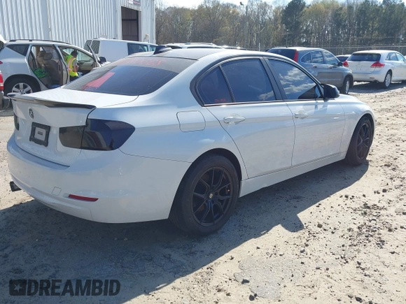 2013 BMW 3 Series 328i with VIN WBA3C1G59DNR47510, listed as a IAAI auction lot 41864290 with 160,585 mi miles. Bid and sale history available at carsss.com. Image 4.