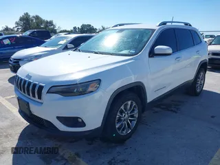2019 Jeep Cherokee Latitude Plus with VIN 1C4PJLLNXKD290098, listed as a IAAI auction lot 40840063 with 202,244 mi miles and . Bid and sale history available at DreamBid. Image 2.