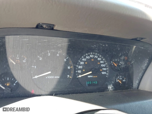 2003 Jeep Grand Cherokee Laredo with VIN 1J4GW48S33C556441, listed as a IAAI auction lot 42026804 with 189,143 mi miles. Bid and sale history available at carsss.com. Image 7.