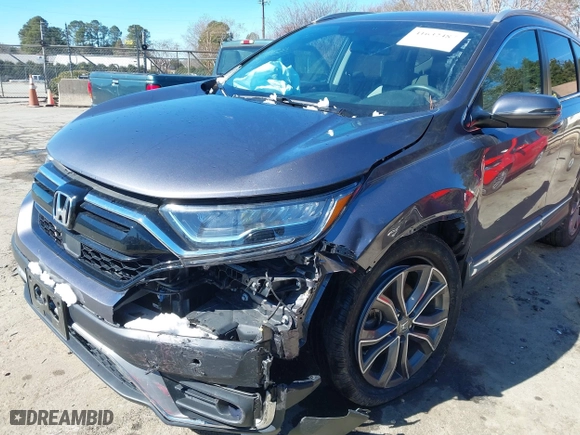 2021 Honda CR-V Touring with VIN 7FARW2H9XME012480, listed as a IAAI auction lot 41632487 with 59,684 mi miles. Bid and sale history available at carsss.com. Image 6.