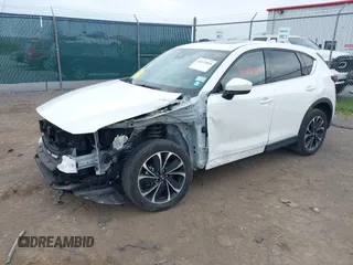 2022 Mazda CX-5 2.5 S Premium Plus Package with VIN JM3KFBEM2N0616960, listed as a IAAI auction lot 42127024 with 30,565 mi miles. Bid and sale history available at carsss.com. Image 2.