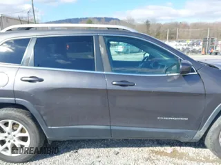 2018 Jeep Cherokee Latitude Plus with VIN 1C4PJLLXXJD606504, listed as a IAAI auction lot 41731085 with 95,569 mi miles. Bid and sale history available at carsss.com. Image 13.