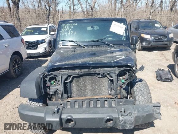 2009 Jeep Wrangler X with VIN 1J4FA24109L754379, listed as a IAAI auction lot 41754925 with 132,500 mi miles and . Bid and sale history available at DreamBid. Image 12.