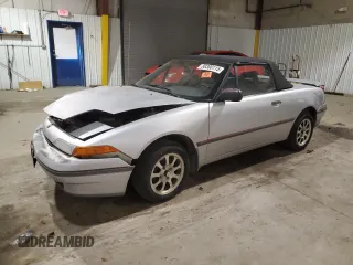 1991 Mercury Capri z VIN 6MPCT0365M8619214, wystawiony jako Copart lot #88300115 z przebiegiem 101 281 mil mil oraz Szkoda całkowita • Salvage title. Historia ofert i sprzedaży dostępna na DreamBid. Obrazek 1.
