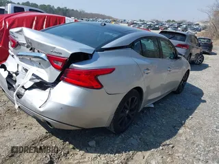 2018 Nissan Maxima SL with VIN 1N4AA6AP4JC395080, listed as a IAAI auction lot 41781646 with 63,693 mi miles and . Bid and sale history available at DreamBid. Image 4.