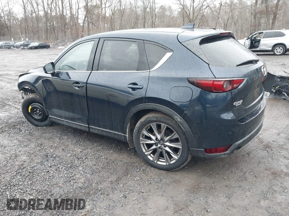 2019 Mazda CX-5 Signature with VIN JM3KFBEY4K0525171, listed as a IAAI auction lot 41706635 with 88,293 mi miles. Bid and sale history available at carsss.com. Image 3.