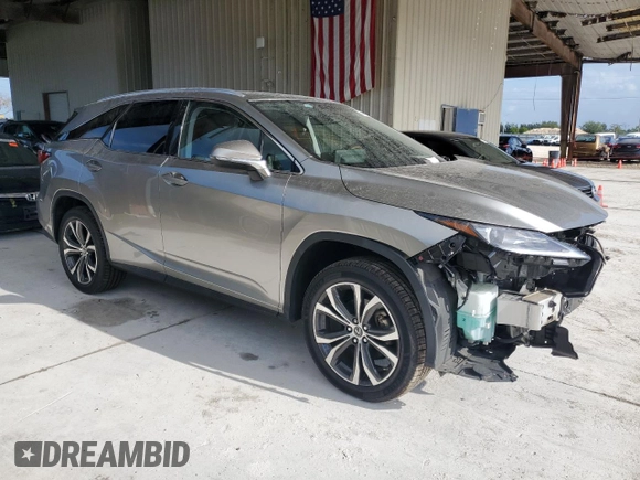 2020 Lexus RX 350L with VIN JTJHZKEA1L2015764, listed as a Copart auction lot 58324465 with 54,860 mi miles and Salvage title. Bid and sale history available at DreamBid. Image 4.