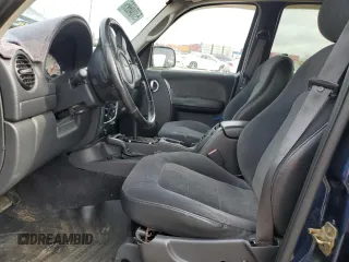 2002 Jeep Liberty Limited with VIN 1J4GL58K52W213948, listed as a Copart auction lot 60555885 with 96,415 mi miles and Salvage title. Bid and sale history available at DreamBid. Image 7.