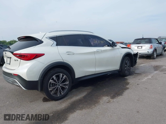 2018 Infiniti QX30 Premium with VIN SJKCH5CR5JA043013, listed as a IAAI auction lot 40327823 with 78,630 mi miles and . Bid and sale history available at DreamBid. Image 4.