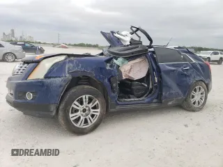 2013 Cadillac SRX Premium Collection с VIN 3GYFNEE3XDS587070, выставлен на аукционе Copart как лот 53607375 с пробегом Не указан миль и Списание • Salvage title. История ставок и продаж доступна на DreamBid. Изображение 1.