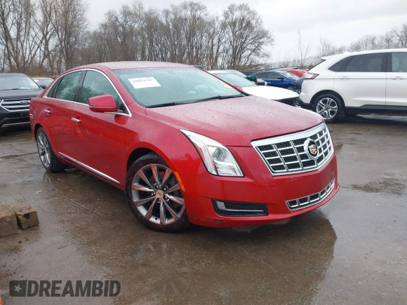 2013 Cadillac XTS z VIN 2G61N5S36D9129188, wystawiony jako IAAI lot #41824147 z przebiegiem 80 985 mil mil oraz . Historia ofert i sprzedaży dostępna na DreamBid. Obrazek 1.