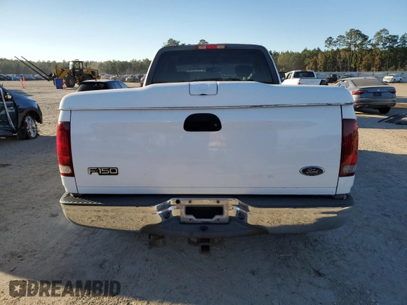 2003 Ford F-150 XL with VIN 1FTRX17L93NA89972, listed as a Copart auction lot 85790884 with 253,763 mi miles and Salvage Title. Bid and sale history available at carsss.com. Image 6.