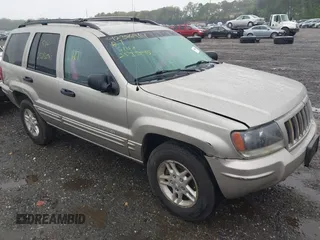 2004 Jeep Grand Cherokee Laredo with VIN 1J4GW48N24C230058, listed as a IAAI auction lot 42386914 with Not provided miles and . Bid and sale history available at DreamBid. Image 1.