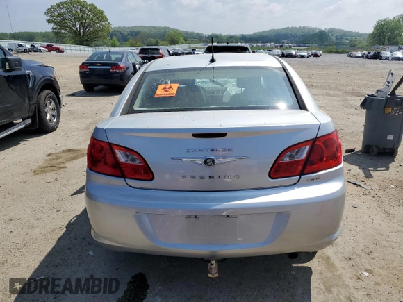 2010 Chrysler Sebring Limited with VIN 1C3CC5FDXAN162044, listed as a Copart auction lot 56789075 with Not provided miles and Non repairable. Bid and sale history available at DreamBid. Image 6.