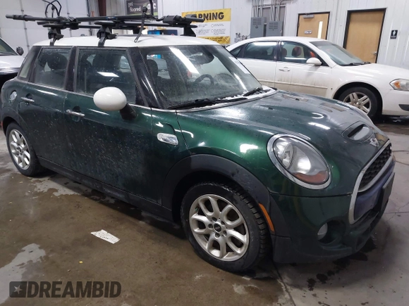 2015 MINI Hardtop 4 Door S z VIN WMWXU3C55FT892293, wystawiony jako IAAI lot #41359066 z przebiegiem 112 704 mil mil oraz . Historia ofert i sprzedaży dostępna na DreamBid. Obrazek 1.