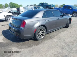 2016 Chrysler 300 with VIN 2C3CCABG6GH321121, listed as a IAAI auction lot 41951797 with 115,170 mi miles. Bid and sale history available at carsss.com. Image 4.
