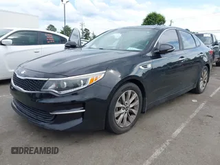 2016 Kia Optima EX z VIN 5XXGU4L35GG050384, wystawiony jako IAAI lot #42467014 z przebiegiem 147 283 mil mil oraz . Historia ofert i sprzedaży dostępna na DreamBid. Obrazek 2.