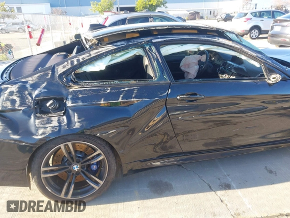 2016 BMW M4 with VIN WBS3R9C51GK336715, listed as a IAAI auction lot 41240988 with 62,245 mi miles and . Bid and sale history available at DreamBid. Image 6.