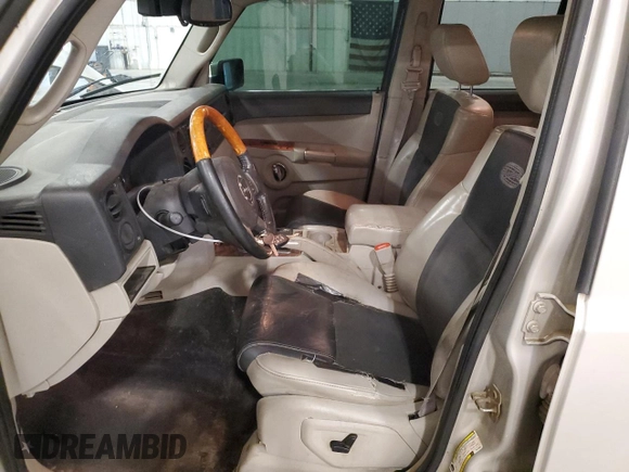 2007 Jeep Commander Overland z VIN 1J8HG68237C610869, wystawiony jako Copart lot #59824675 z przebiegiem 229 092 mil mil oraz Szkoda całkowita • Salvage title. Historia ofert i sprzedaży dostępna na DreamBid. Obrazek 7.