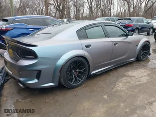 2020 Dodge Charger Scat Pack with VIN 2C3CDXGJ7LH157411, listed as a IAAI auction lot 41226695 with 52,108 mi miles. Bid and sale history available at carsss.com. Image 4.