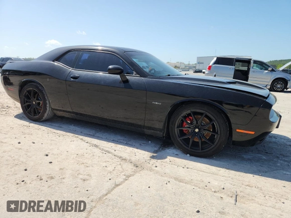 2015 Dodge Challenger R/T with VIN 2C3CDZAT5FH708770, listed as a Copart auction lot 61968725 with 181,917 mi miles and Salvage title. Bid and sale history available at DreamBid. Image 4.