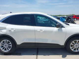 2022 Ford Escape SE z VIN 1FMCU9G60NUC01957, wystawiony jako IAAI lot #42221467 z przebiegiem 46 836 mil mil oraz . Historia ofert i sprzedaży dostępna na DreamBid. Obrazek 13.