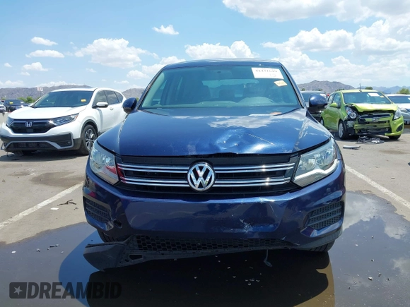 2013 Volkswagen Tiguan with VIN WVGCV3AX6DW605876, listed as a IAAI auction lot 42431619 with 106,279 mi miles and . Bid and sale history available at DreamBid. Image 12.