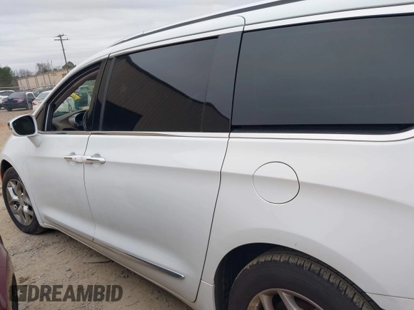 2017 Chrysler Pacifica Limited with VIN 2C4RC1GG2HR704936, listed as a IAAI auction lot 41162671 with 161,422 mi miles and . Bid and sale history available at DreamBid. Image 14.