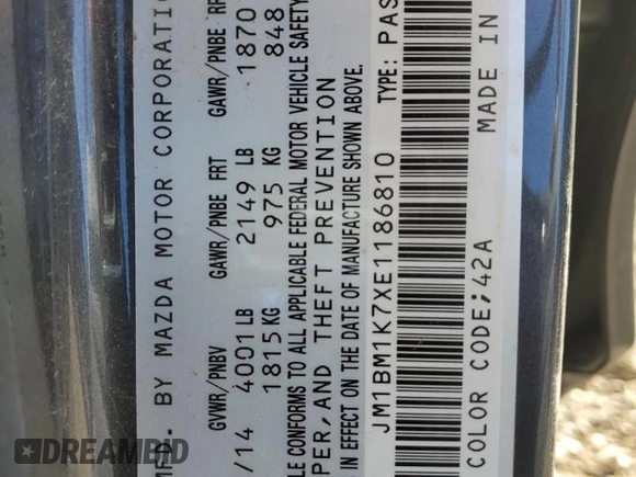 2014 Mazda 3 i Sport with VIN JM1BM1K7XE1186810, listed as a Copart auction lot 42239495 with 136,947 mi miles and Salvage Title. Bid and sale history available at DreamBid. Image 12.