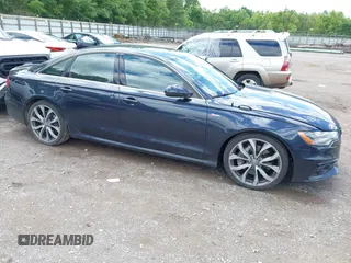 2013 Audi A6 Prestige with VIN WAUJGAFC1DN050046, listed as a IAAI auction lot 42364591 with 101,377 mi miles and . Bid and sale history available at DreamBid. Image 6.