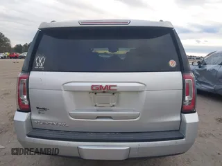 2019 GMC Yukon XL SLT with VIN 1GKS1GKC8KR383694, listed as a IAAI auction lot 41466213 with 128,368 mi miles. Bid and sale history available at carsss.com. Image 16.