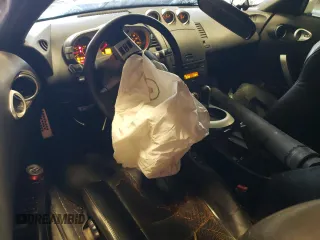 2007 Nissan 350Z with VIN JN1BZ34D77M500028, listed as a Copart auction lot 62935404 with 180,593 mi miles and Salvage Title. Bid and sale history available at DreamBid. Image 8.