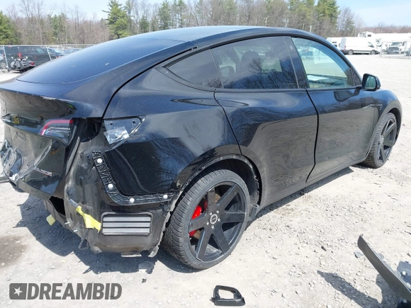 2022 Tesla Model Y Performance with VIN 7SAYGDEF7NF310113, listed as a IAAI auction lot 42038407 with 46,052 mi miles and . Bid and sale history available at DreamBid. Image 4.